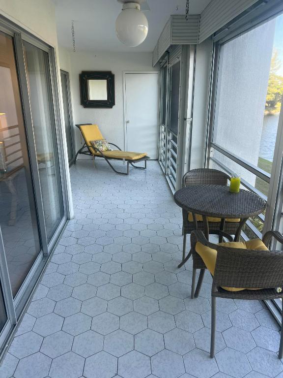 POINCIANA PLACE CONDO A,B AND C - Residential