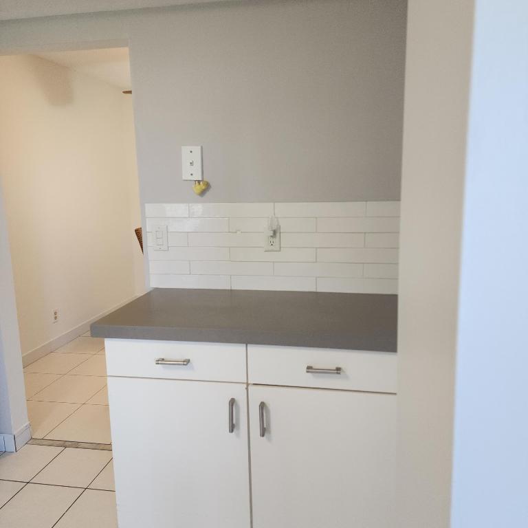 POINCIANA PLACE CONDO A,B AND C - Residential