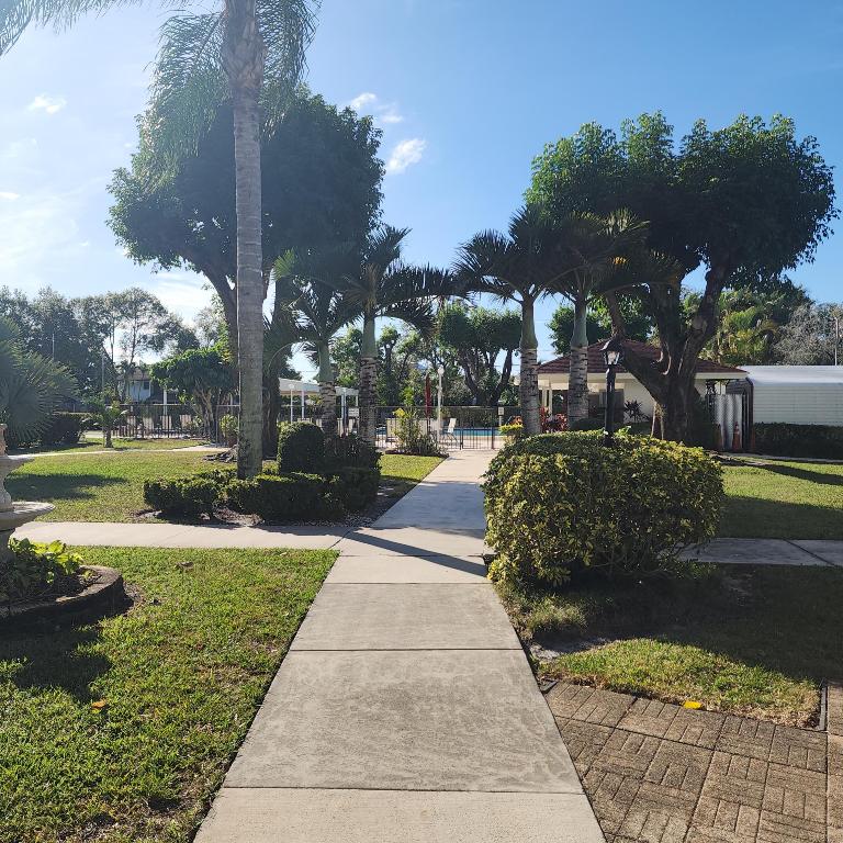 POINCIANA PLACE CONDO A,B AND C - Residential
