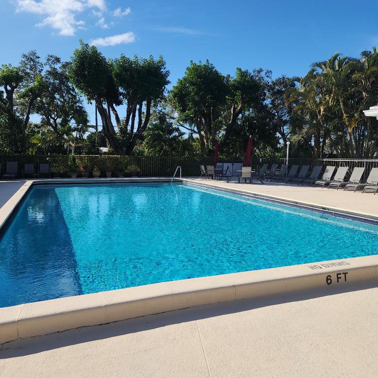 POINCIANA PLACE CONDO A,B AND C - Residential