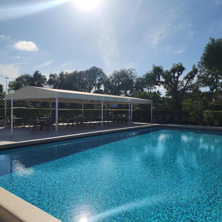 POINCIANA PLACE CONDO A,B AND C - Residential