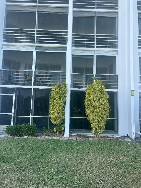 POINCIANA PLACE CONDO A,B AND C - Residential