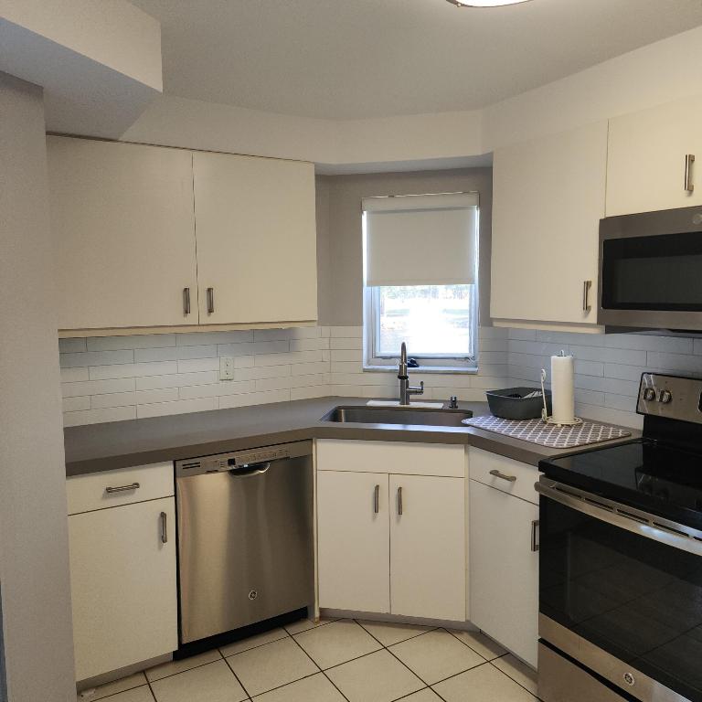 POINCIANA PLACE CONDO A,B AND C - Residential