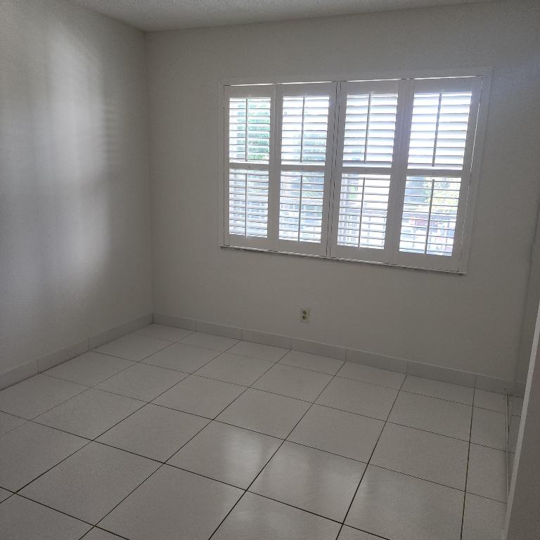 POINCIANA PLACE CONDO A,B AND C - Residential