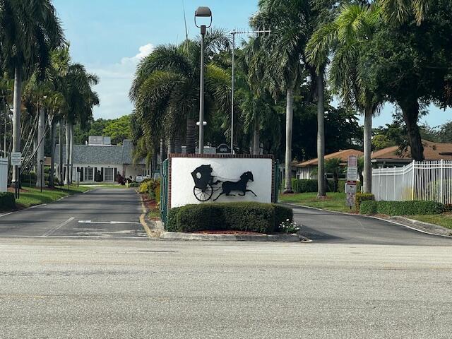 55+ Community at Country Manors. Charming corner unit with Mexican tile throughout, and Bahama shutters in the heart of Delray Beach. Custom walking closets, accordion shutters for hurricane protection, laundry / utility room with lots of storage cabinets. Property is just steps to the Clubhouse and minutes from the beautiful downtown Delray Beach.