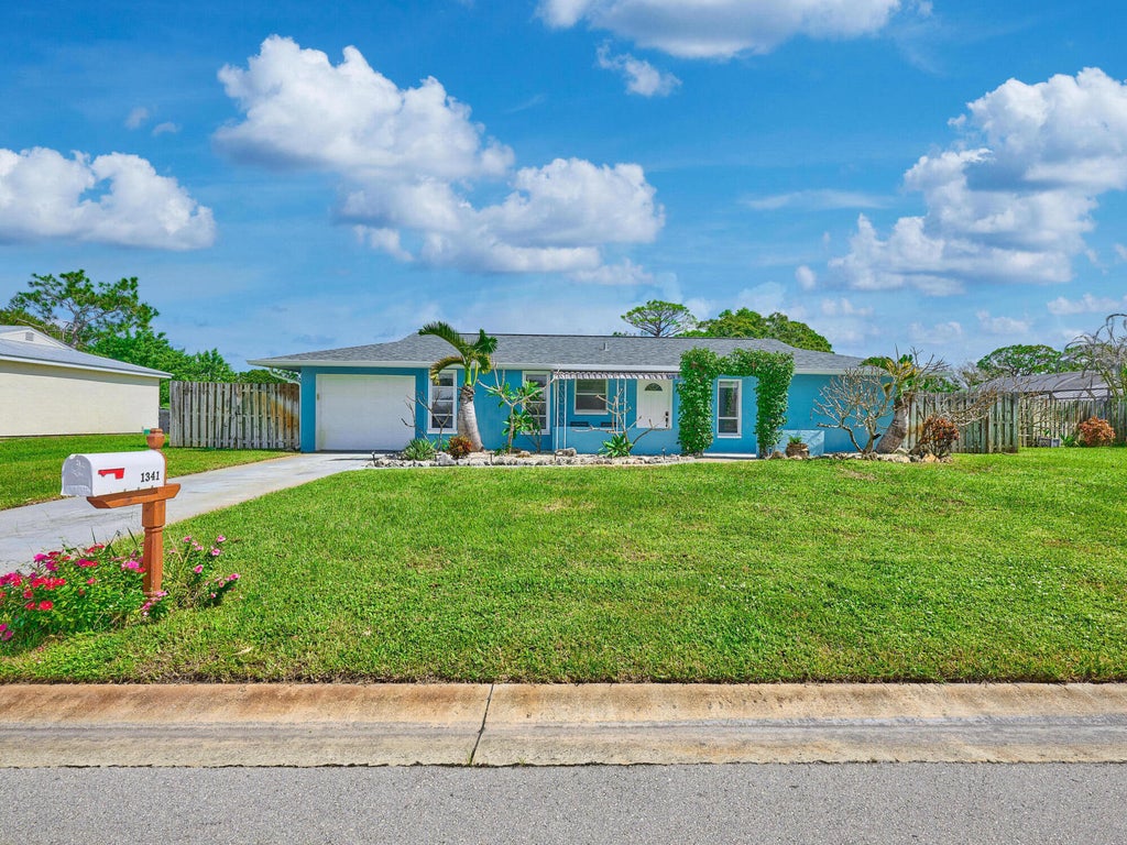 Photo of 1341 SE MOHAVE Street, Port Saint Lucie, FL 34952 (MLS # B26078590)