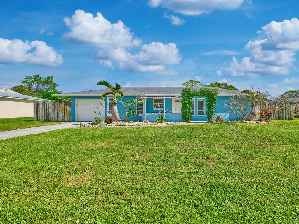 Photo of 1341 SE MOHAVE Street, Port Saint Lucie, FL 34952 (MLS # B26078590)