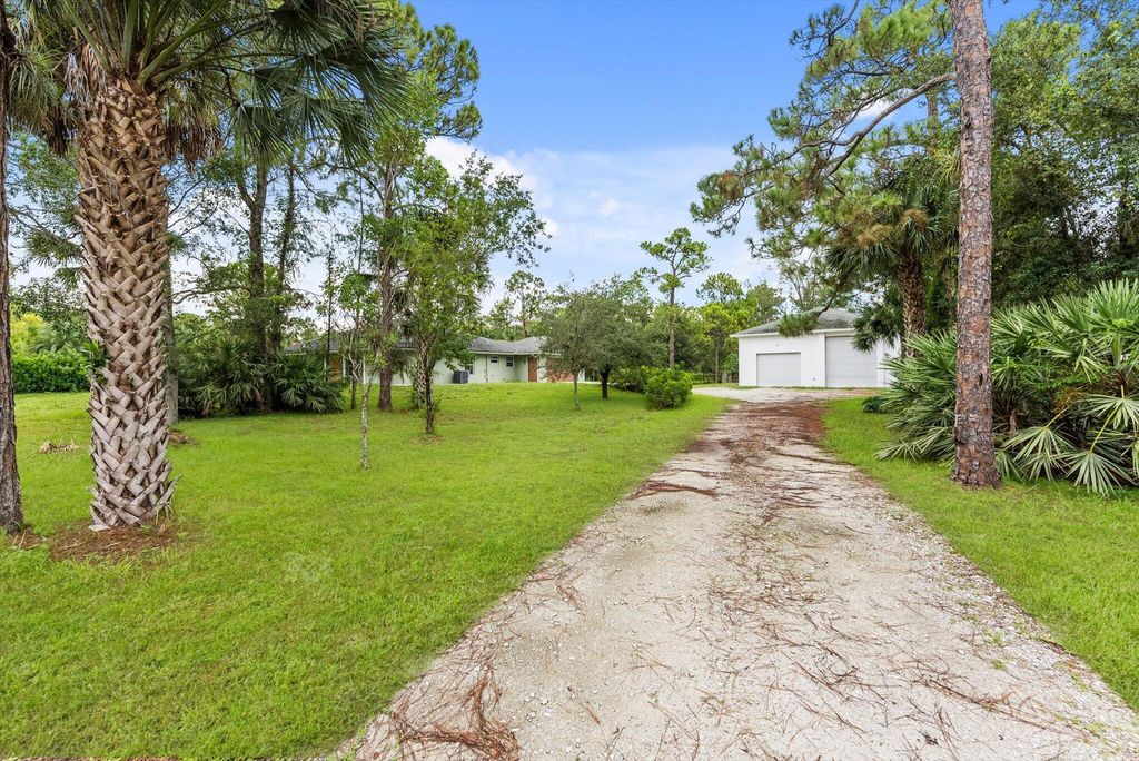 Photo of 16929 W Downers Drive, Loxahatchee, FL 33470 (MLS # R11011611)