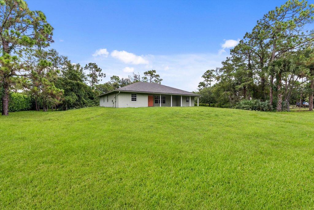 Photo of 16929 W Downers Drive, Loxahatchee, FL 33470 (MLS # R11011611)