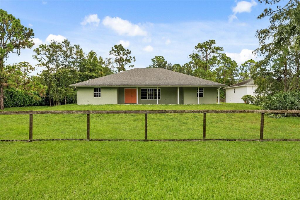 Photo of 16929 W Downers Drive, Loxahatchee, FL 33470 (MLS # R11011611)