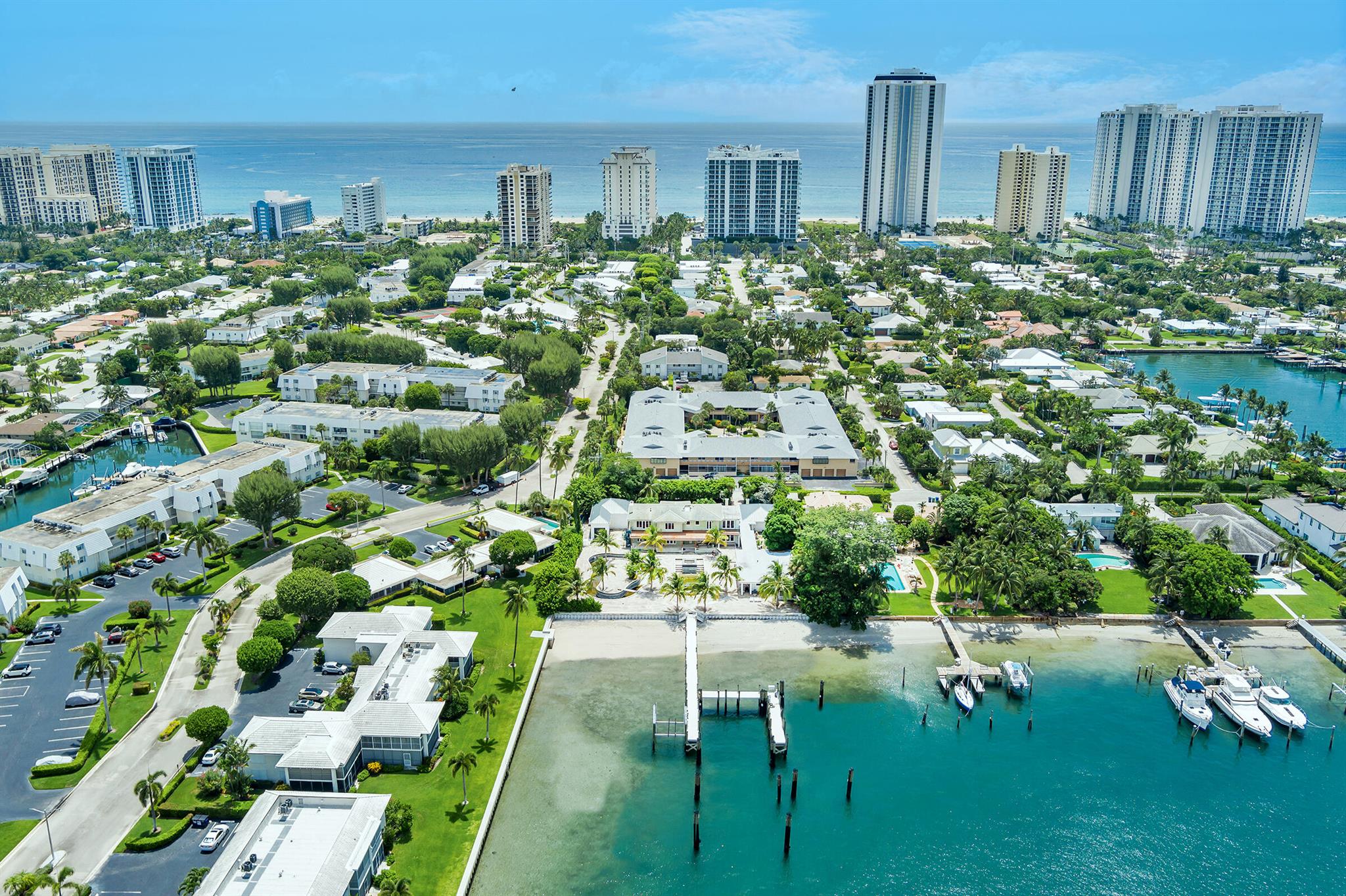 Unmatched Waterfront Estate Opportunity on Singer Island. Welcome to the largest waterfront lot on Singer Island north of the bridge--a truly rare offering boasting 159 feet of direct Intracoastal frontage and breathtaking panoramic wide-water views. The main house has been taken down to the studs and is ready to be reimagined--plans available. Set on 3/4 of an acre, this private estate epitomizes the pinnacle of South Florida coastal living, just minutes from the Palm Beach Inlet and within walking distance to pristine beaches.Tailored for serious boating enthusiasts, the property features a new seawall and dock, four oversized boat slips--including accommodations for large yachts--24,000 lb Hurricane Boat Lift, 480V 3 Phase power, and water. The expansive grounds include