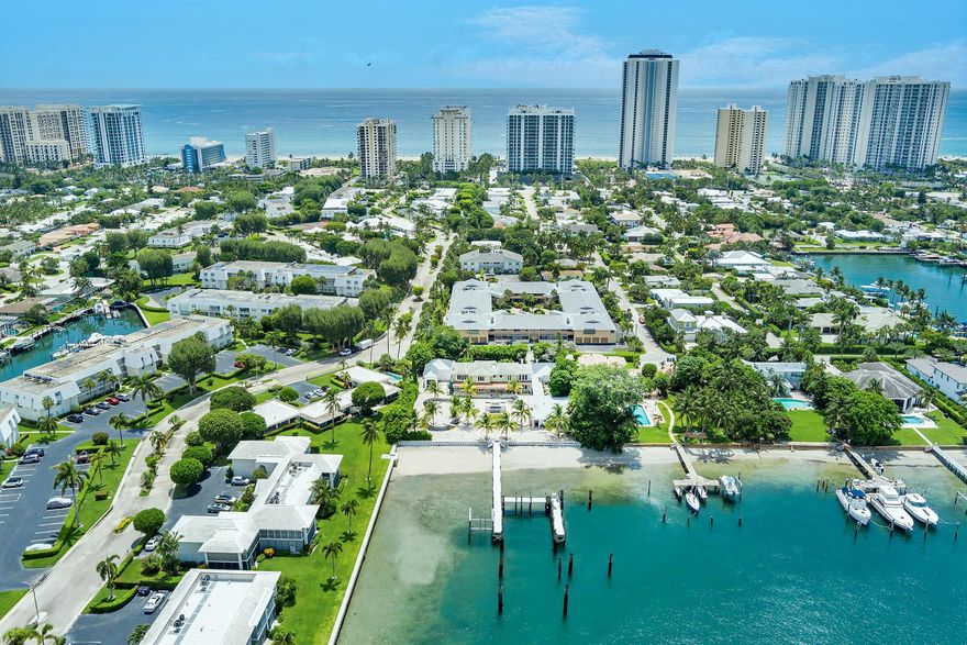 Unmatched Waterfront Estate Opportunity on Singer Island. Welcome to the largest waterfront lot on Singer Island north of the bridge--a truly rare offering boasting 159 feet of direct Intracoastal frontage and breathtaking panoramic wide-water views. The main house has been taken down to the studs and is ready to be reimagined--plans available. Set on 3/4 of an acre, this private estate epitomizes the pinnacle of South Florida coastal living, just minutes from the Palm Beach Inlet and within walking distance to pristine beaches.Tailored for serious boating enthusiasts, the property features a new seawall and dock, four oversized boat slips--including accommodations for large yachts--24,000 lb Hurricane Boat Lift, 480V 3 Phase power, and water. The expansive grounds include