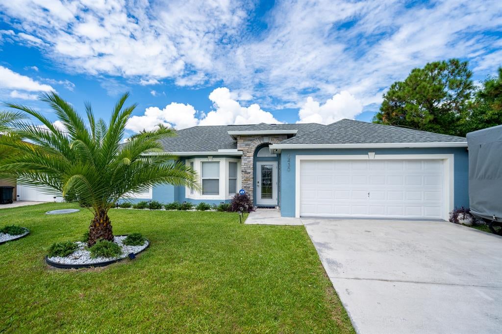 Photo of 5430 NW Crista Street, Port Saint Lucie, FL 34986 (MLS # R10827920)