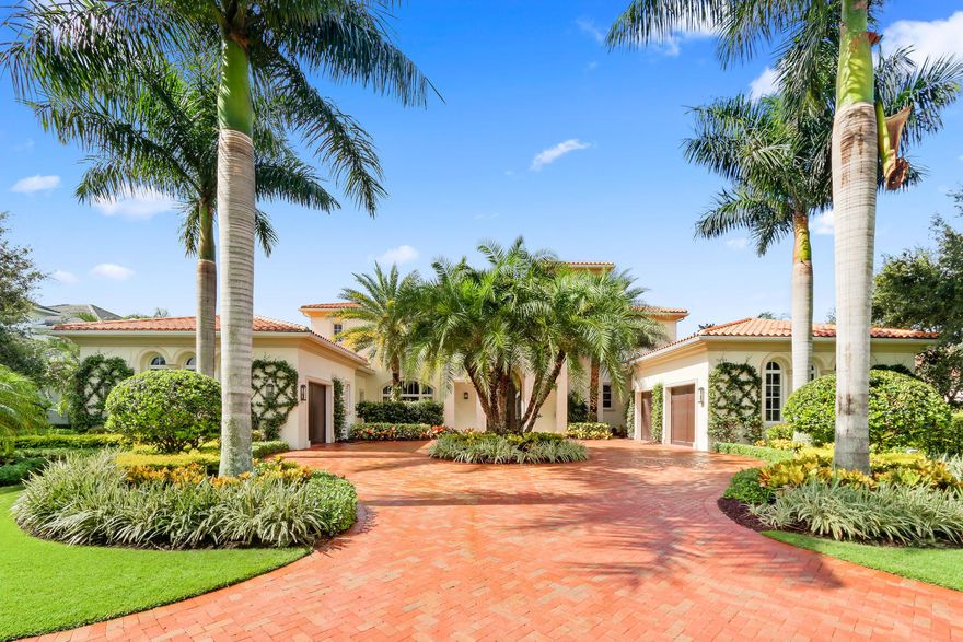 Light and bright best describes this beautiful home in Palm Beach Gardens.  Lush landscaping greets you as you pull into the circular driveway.  As you enter the home you notice the large pool and patio area overlooking a serene water feature.  The spacious gourmet kitchen with oversized island is perfect for entertaining family and friends.  There are two bedrooms downstairs one for a guest and the other an extremely large master suite.  Offering large built-in closets and his and her separate area's. There is also a media/office downstairs for family movie night.  Upstairs is perfect for kids or grandkids, offering 3 large en suite bedrooms and a fantastic loft for fun and games.  Old Palm Golf Club is by far one of the best country clubs in the Palm Beaches. Offering a beach club, fine