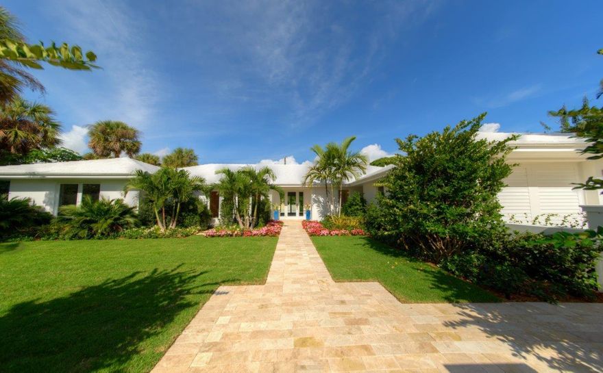 Stunning North End Bermuda situated on large lot featuring 4 Bedrooms plus Den and 4.2 Baths, Separate outdoor Gazebo with fireplace, flat screen TV and Summer Kitchen, Beautiful pool area with wonderful entertaining space accented by Tropical Gardens, Gorgeous hardwood flooring. Large open kitchen with top of the line appliances. Oversized 2 car garage. Excellent Beach Access.