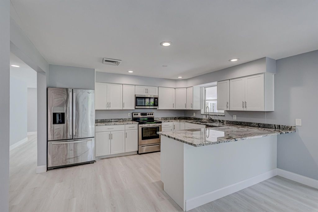 Photo of 12124 153rd Court N, Jupiter, FL 33478 (MLS # R10970240)