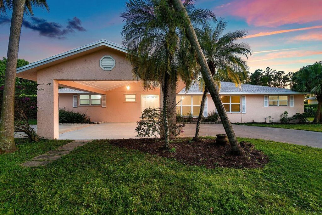 Photo of 12124 153rd Court N, Jupiter, FL 33478 (MLS # R10970240)