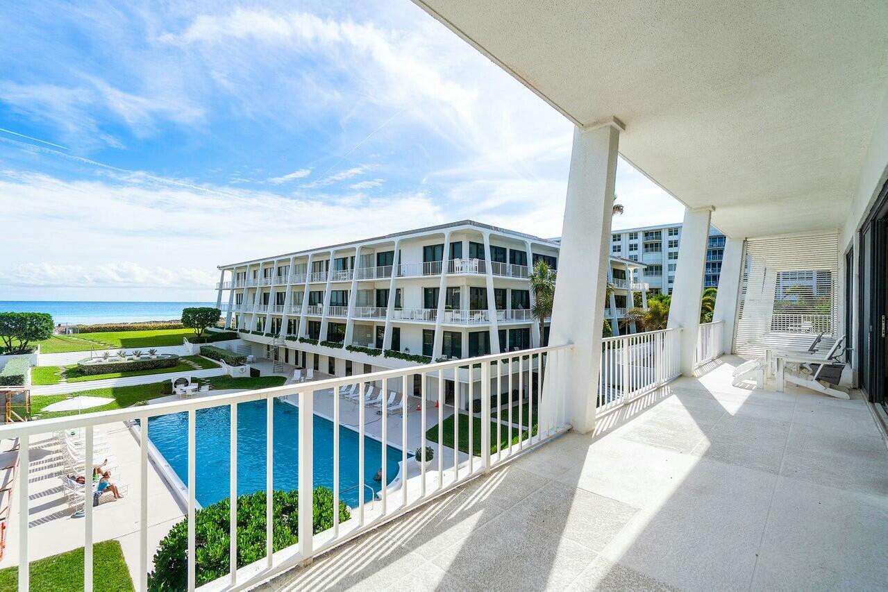Presenting a rare opportunity to own a double unit in The Reef Palm Beach, one of the most sought-after, historically designated mid-century modern buildings in Palm Beach. Designed by renowned architect Gene Lawrence, this architectural gem combines the elegance of classic design with modern luxury, offering an unparalleled living experience. This offering features two expansive units, totaling 4 bedrooms and 4.5 baths, with dramatic direct east and north exposures. Key Features: Historic Gene Lawrence Mid-Century Modern Architecture - A historically designated property, showcasing timeless design and impeccable craftsmanship. 4 Bedrooms & 4.5 Baths - An expansive layout offering spacious living, perfect for both family living and sophisticated entertaining.