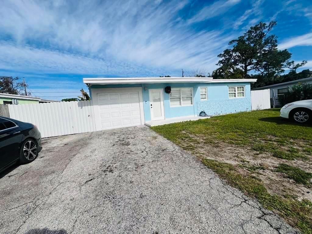 Photo of 5541 N Lewis Road, West Palm Beach, FL 33415 (MLS # R11157569)