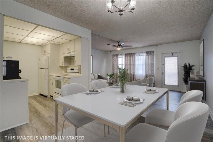 BRIGHT and CLEAN , 1/1.5 PENTHOUSE in NEWPORT U building . Come see what this condo has to offer. It is ready for you to make it your Own. A lot of updates: the condo has new paint, new ceiling fans, new laminate flooring throughout entire condo, new bathrooms, new stove , new lighting. Close to the elevator..The Florida room you can use as an office or just to enjoy your morning coffee. looking the BEAUTIFUL CANAL VIEW! The community has a clubhouse, gym, pools, theater, tennis, different classes, and free transportation inside and out. Close to the beach, restaurants, shopping, and more. Water and basic cable are included in the HOA fee. This is a 55+ community