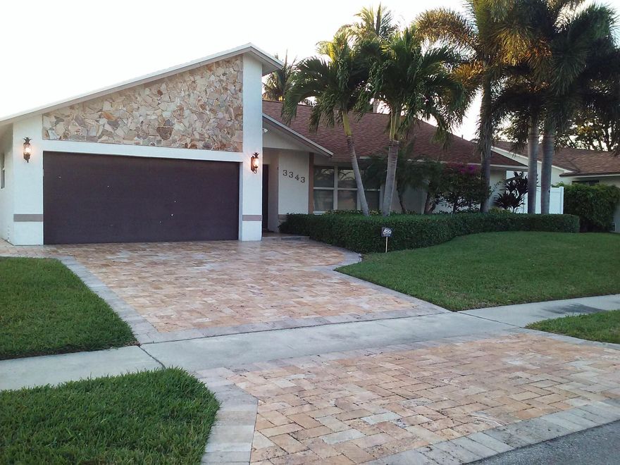 Completely updated home in Central Boca Raton. Custom Kitchen, Split Bedroom Plan: Outstanding rear pool & patio complete with outside bar: Travertine flooring throughout interior: Mounted TV in all rooms; [ Available partially furnished.] Pool & lawn Service Included in rental price.