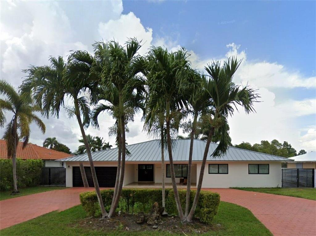 Home Shows As NEW! New Roof and Impact Windows & Doors! New Kitchen and Appliances! Remodeled Bathrooms! And Definitely More! Expansively Modern Open Floorplan, True 4 Bedroom and 3 Full Bathrooms with Tasteful Polished Marble Flooring Throughout! ""Soccer Size LOT, World Cup Class !!!"" Approaching 28,000 sq ft! Massive Patio Area With Lagoon Style/Size Pool "36ftx18ft" Complimented With Elevated Spa & Separate Cabana! Entire Property is Fenced and Secure! Inside Laundry, Covered Foyer Entry, and Enormous Solid 'Stamped & Sealed' Concrete Driveway! Fabolous Designer Street Lined With Estate Sized Properties! Easy Drive to Downtown!