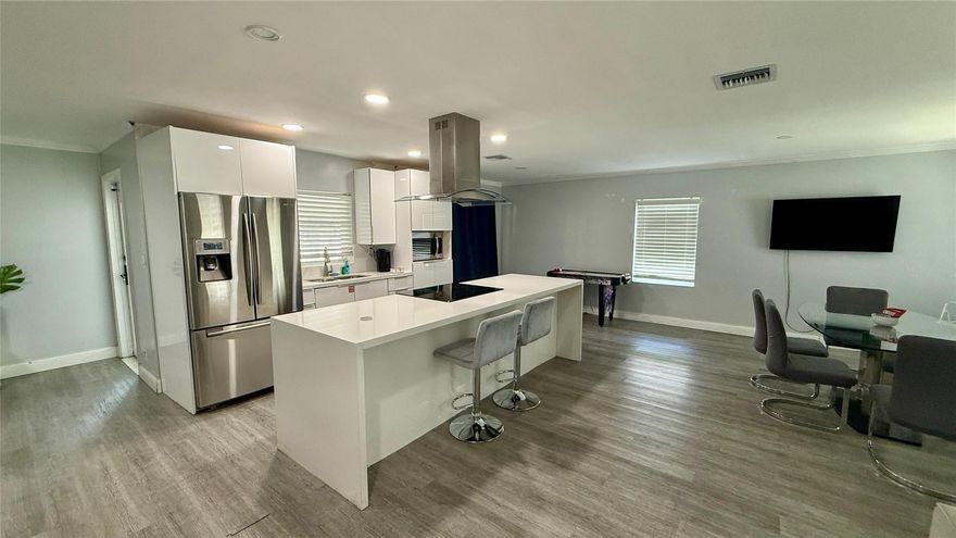 Welcome to your fully remodeled dream home in the highly sought-after North Lauderdale area of Broward! This stunning 4-bed, 3-bath home features a sparkling pool and a fully fenced yard, perfect for enjoying the Florida lifestyle. Step inside and be captivated by the elegant vinyl flooring that flows seamlessly throughout the home. The modern kitchen boasts updated appliances, making cooking and entertaining a delight. Enjoy the spacious all remodeled bathrooms. The converted garage suite provides a versatile space that can serve as a private efficiency or an additional short-term income opportunity. Move-in ready and thoughtfully upgraded, this home offers comfort, style, and functionality—all in a prime location close to shopping, dining, and major highways.