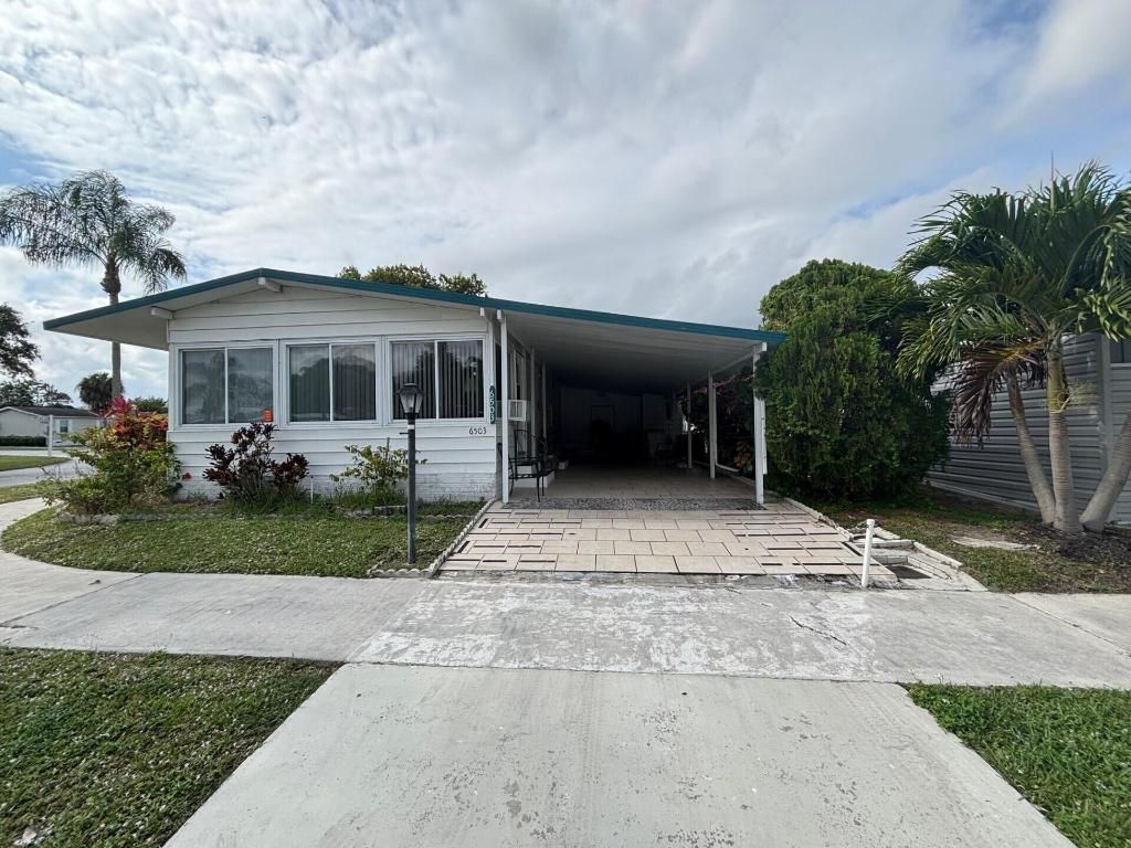 Photo of 6503 NW 34th Ave, Coconut Creek, FL 33073 (MLS # R11152189)