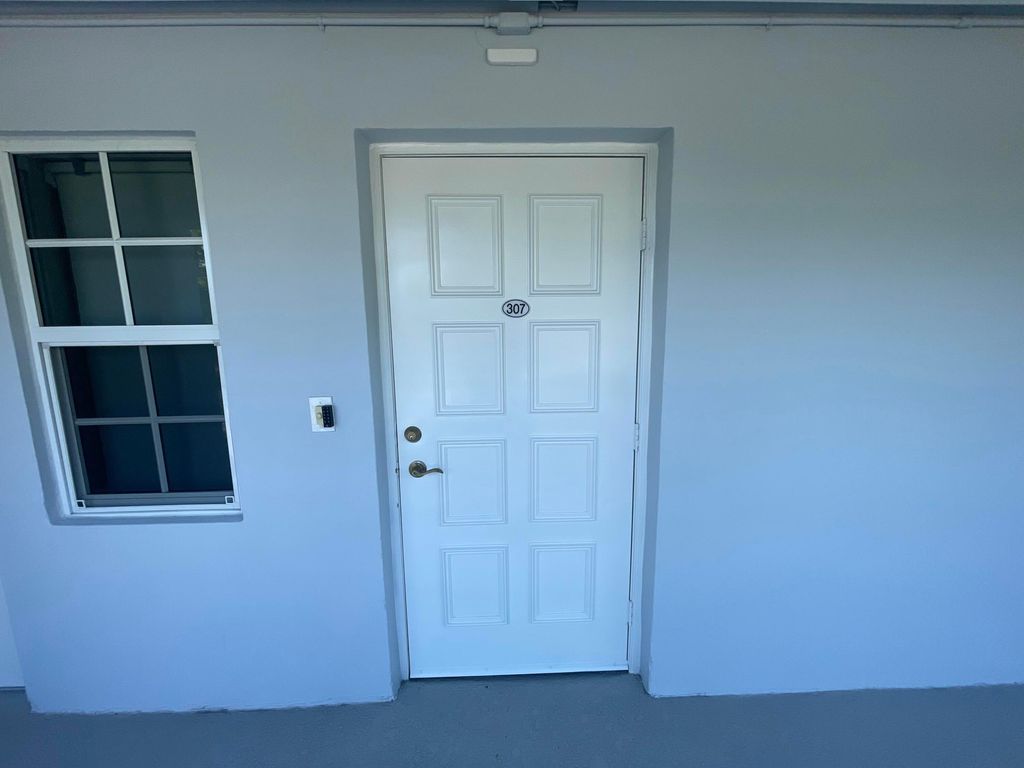 Photo of 3100 N Course Lane #307, Pompano Beach, FL 33069 (MLS # B26005680)