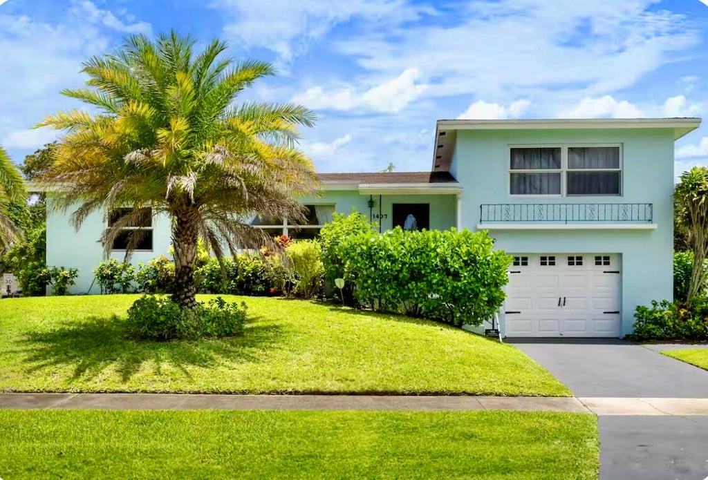 Photo of 1407 ONTARIO Drive, Lake Worth, FL 33461 (MLS # B26064937)