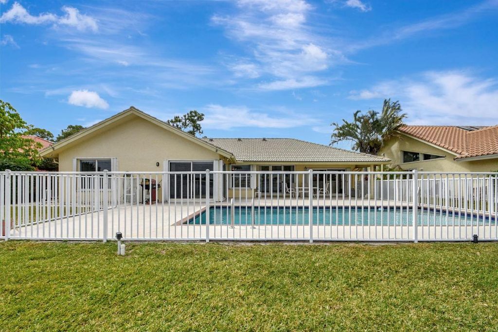 Photo of 6963 Lake Island Drive, Lake Worth, FL 33467 (MLS # R10976325)