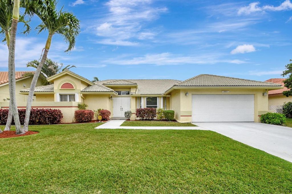 Photo of 6963 Lake Island Drive, Lake Worth, FL 33467 (MLS # R10976325)
