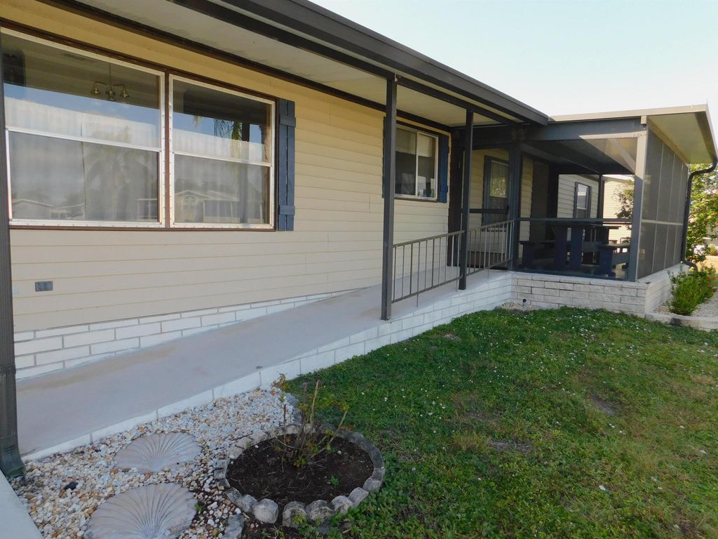 Photo of 552 Tropical Isles Circle, Fort Pierce, FL 34982 (MLS # R10933421)