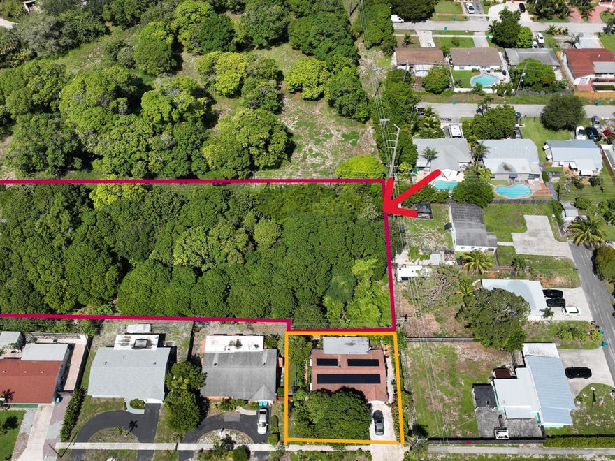 Versatile Land with Income Potential - Lychee, star fruit, longan, Jackfruit, Sapodilla opportunity to own a fruit-producing parcel just off a major road—ideal for residential living, supplemental income, or future development. This fertile piece of land features established lychee and mango trees, offering seasonal harvests that can generate extra income through local markets, roadside stands, or farm-to-table sales.