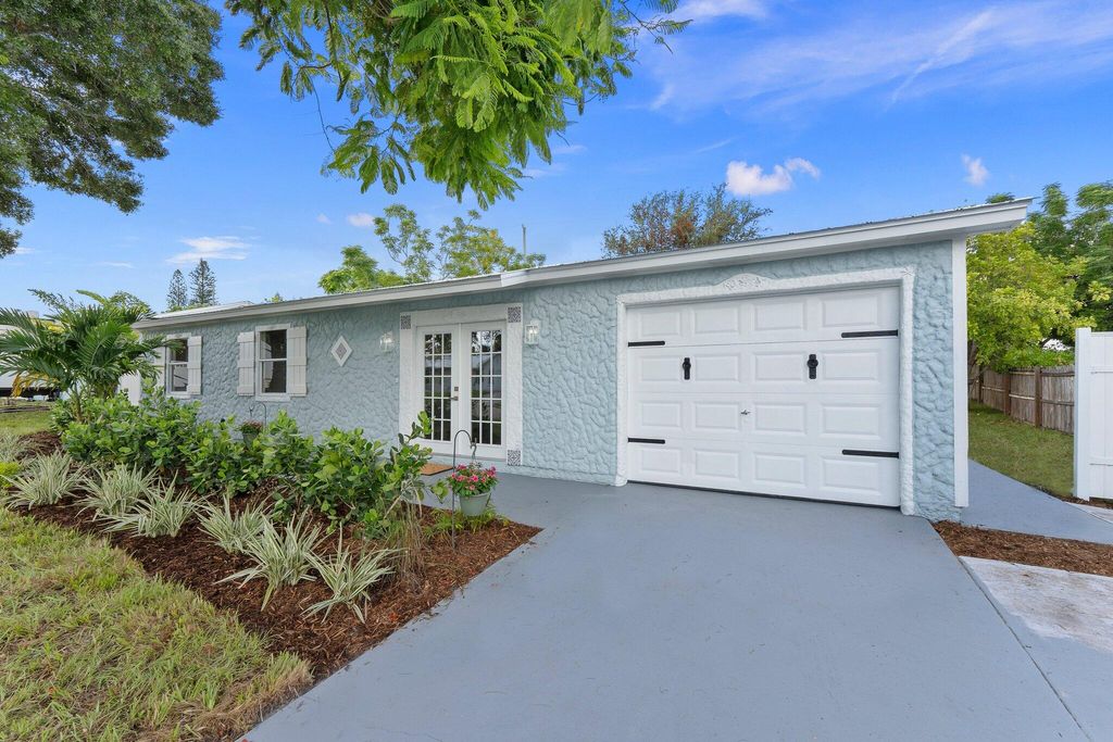 Photo of 1720 NE 23rd Terrace, Jensen Beach, FL 34957 (MLS # R11007504)