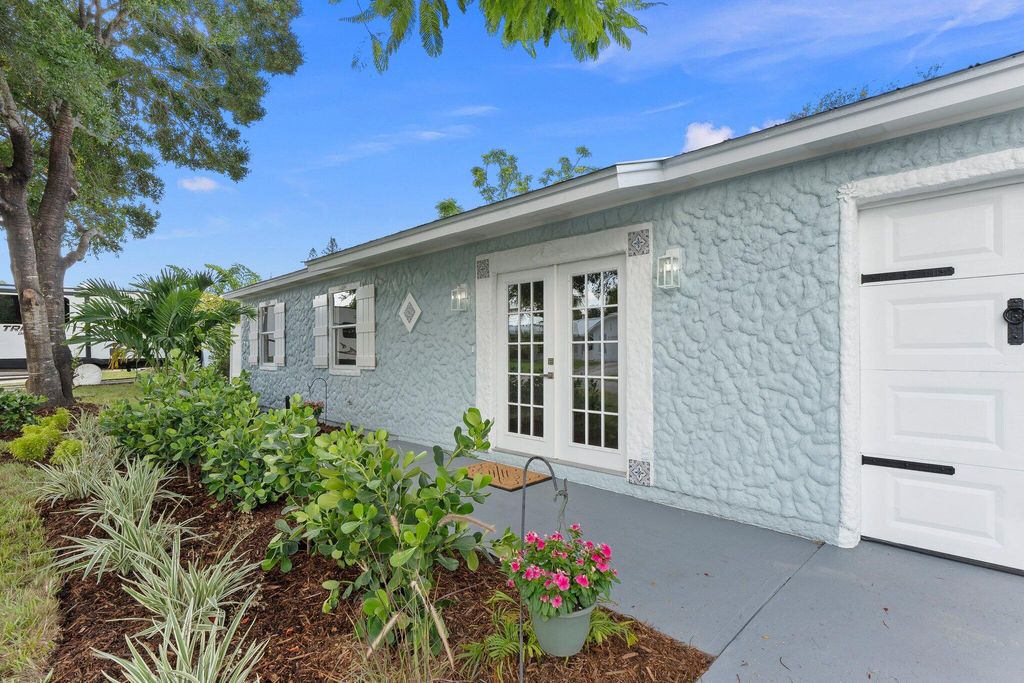 Photo of 1720 NE 23rd Terrace, Jensen Beach, FL 34957 (MLS # R11007504)