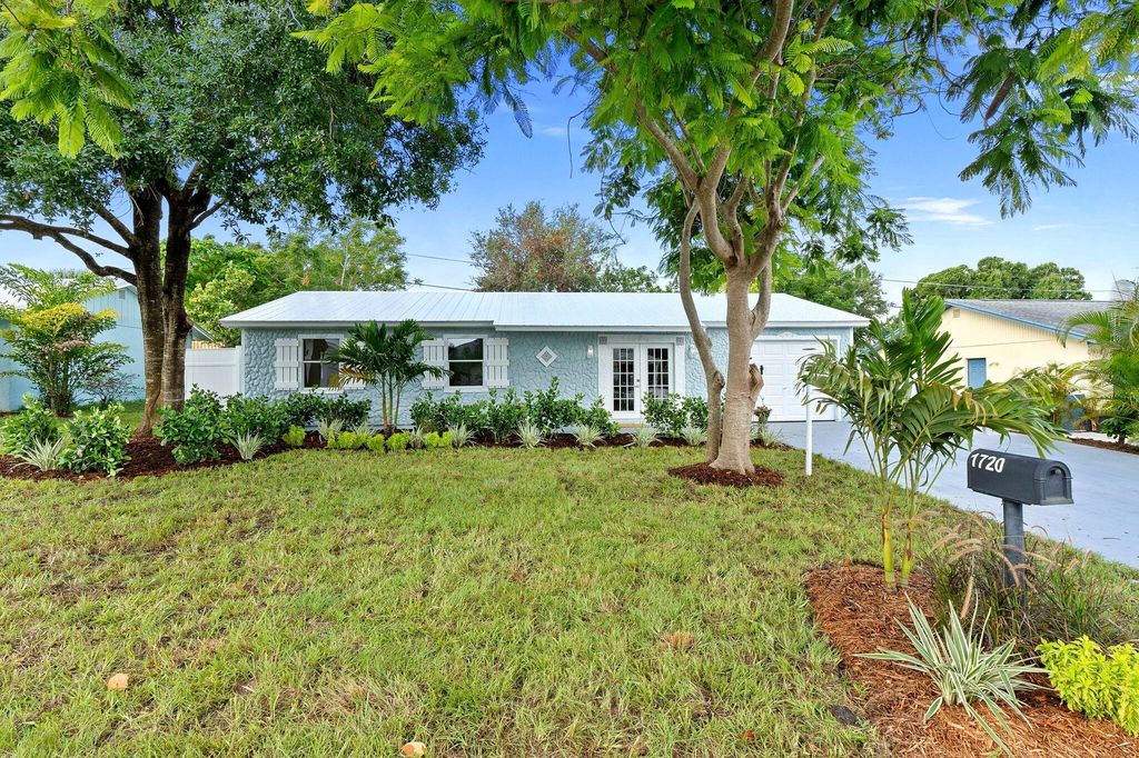 Photo of 1720 NE 23rd Terrace, Jensen Beach, FL 34957 (MLS # R11007504)