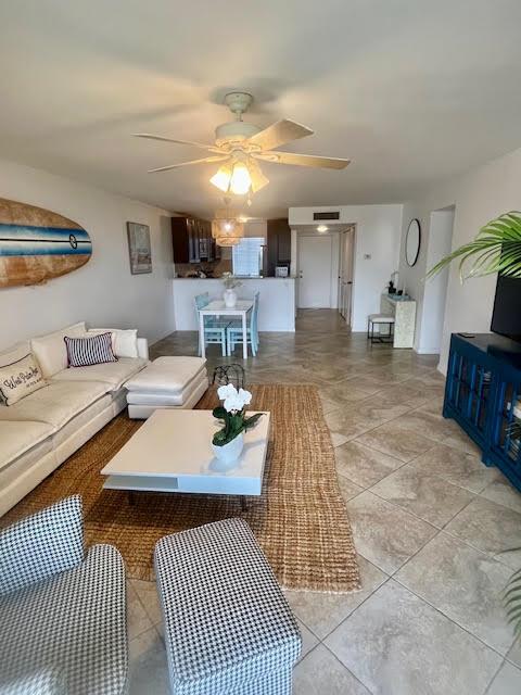 INVESTOR WANTED! This beautifully updated penthouse 2/2 condo is occupied with a tenant that would like to stay long term after closing. Centrally located in WPB. Not a 55+ community, The Tennis Club of Palm Beach has 22 Har-Tru tennis courts, tennis pro shop, Olympic size pool and plenty of land for walking, relaxing and enjoying where you live! The condo has been updated with a new, open kitchen, new bathrooms and flooring throughout. AC new 2022. New microwave, dishwasher and W/D 11/24. Accordion hurricane shutters installed 2018. DON'T MISS THIS OPPORTUNITY!