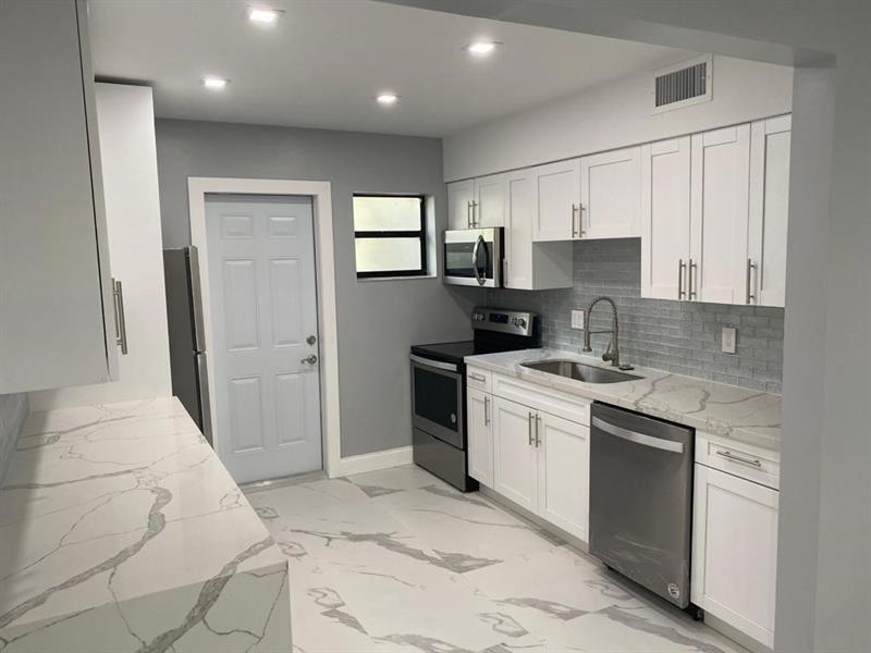 GORGEOUS 2BED 1BATH AT THE DESERBLE RIVERSIDE PARK! UNIT HAS BEEN COMPLETELY REMODELED WITH NEW TILE FLOORING THROWOUT, NEW UPDATED KITCHEN AND STAINLESS STEEL APPLIANCES, NEW BATHROOM TILE AND FIXTURES, NEW AC UNIT, NEW INTERIOR AND EXTERIOR DOORS WITH A NICE FRONT PATIO AND BACKYARD! WASHER AND DRYER ARE IN UNIT! GREAT LOCATION CLOSE TO LAS OLAS AND MAIN ROADS! PETS ARE WELCOME! WILL NOT LAST! PRICE INCLUDING WATER.