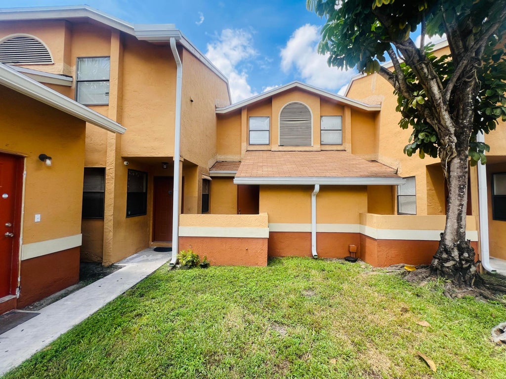 Photo of 2491 NW 56th Avenue #103, Lauderhill, FL 33313 (MLS # B26071705)