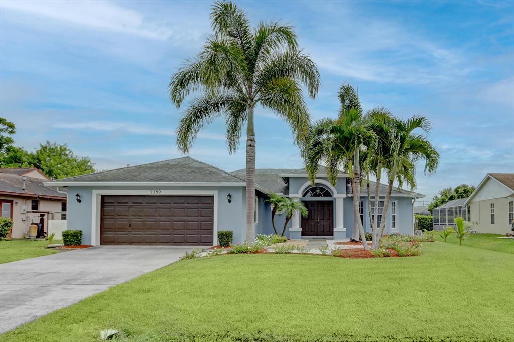 Enter through double doors in to this 3 bed/ 2.5 bath with den and screened patio. with room for a pool very well landscaped; built with modern architecture and split floor plan. Updated kitchen features sophisticated cabinetry, granite counter-tops ,newer stainless steel appliances and mosaic backsplash. Open floor plan has vaulted ceilings giving an open and airy feel. Large master bedroom and bathroom is equipped with dual walk-in closets, double sink vanity, separate tube/shower combo. NEW A/C just installed. water heater replaced in 2019 hurricane enforced garage door. House is equipped with Hurricane shutters. centrally located close to shopping, restaurants , highways and schools