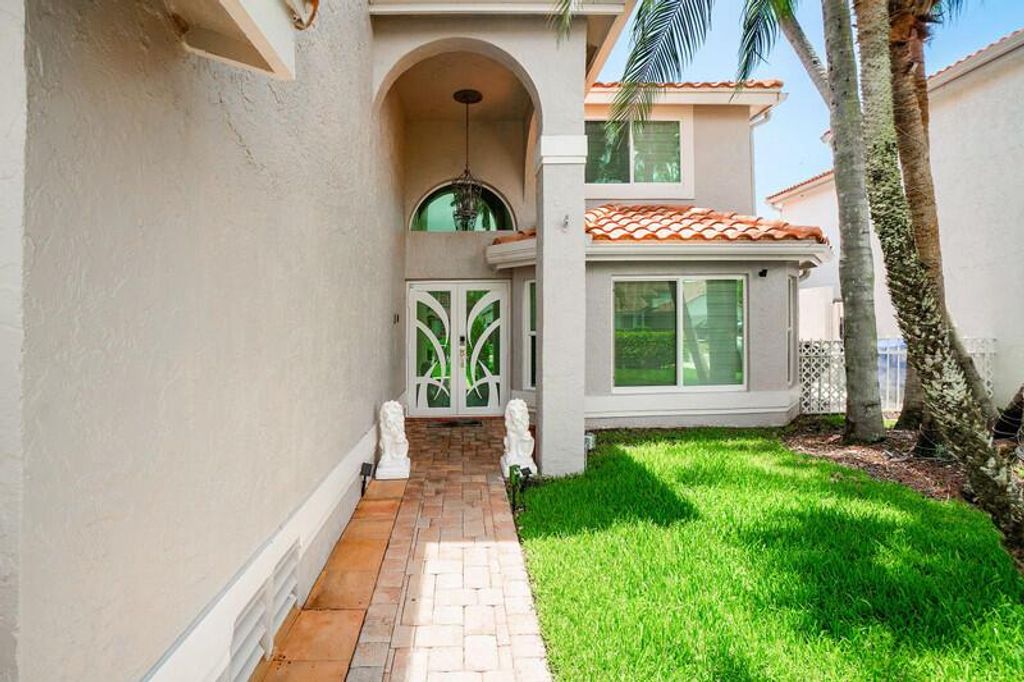 Photo of 10330 Buena Ventura Drive, Boca Raton, FL 33498 (MLS # R11095306)