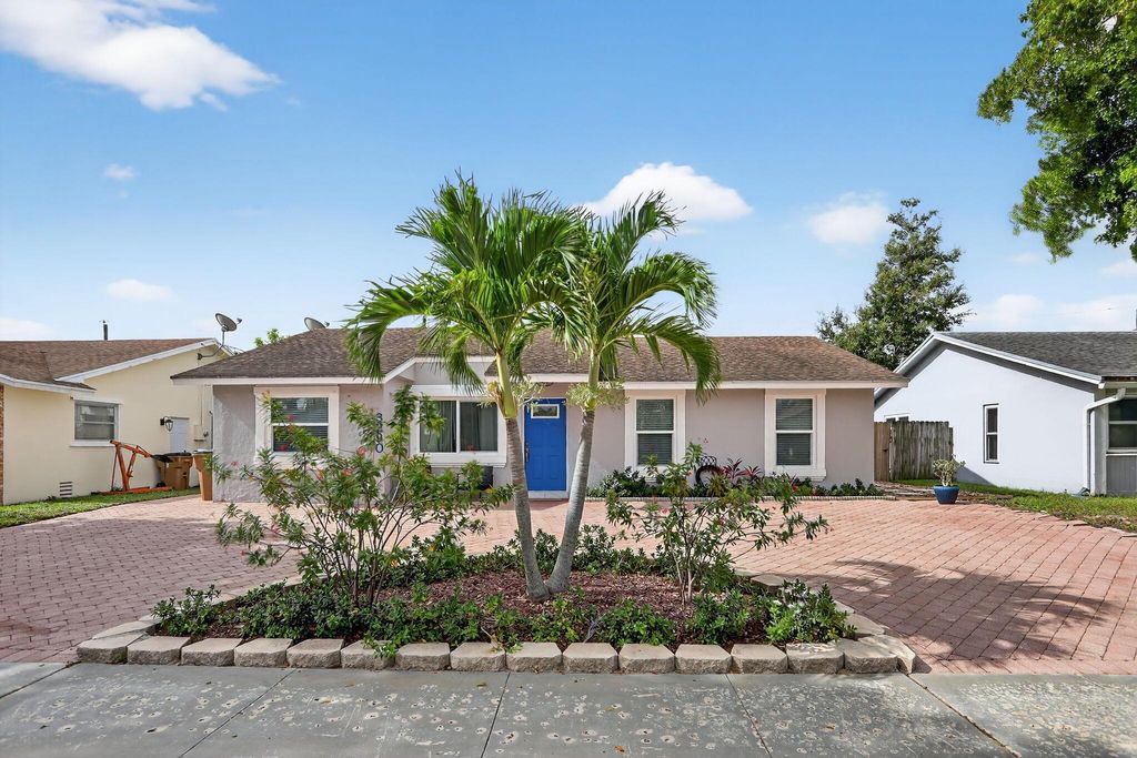 Photo of 3290 SW 2nd Street, Deerfield Beach, FL 33442 (MLS # R11110700)