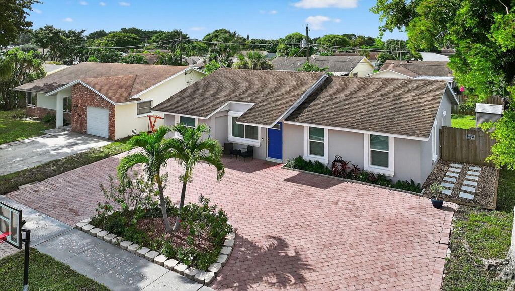 Photo of 3290 SW 2nd Street, Deerfield Beach, FL 33442 (MLS # R11110700)