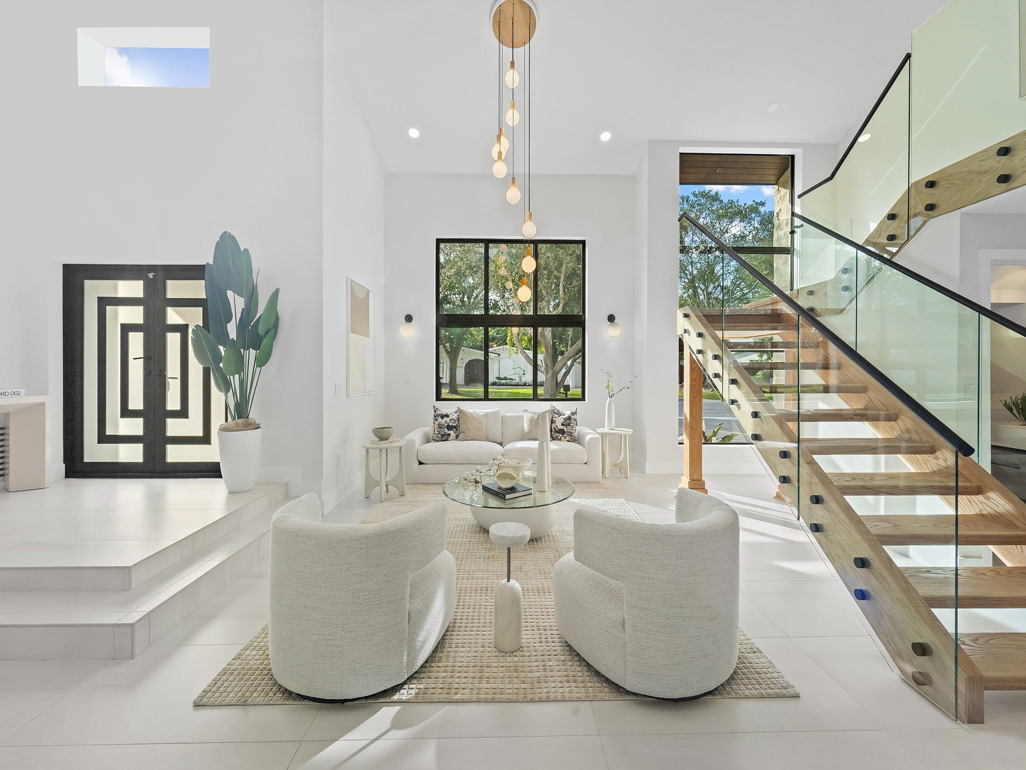Step into luxury with this fully remodeled 3,450 sqft masterpiece in prestigious North Palmetto Bay, just a street from Pinecrest! Featuring 5 bedrooms + office, 4.5 bathrooms, and a two-car garage, this two-story home is perfect for modern family living. The primary suite offers a spa-like bathroom, an incredible walk-in closet, and doors opening to a serene backyard oasis. Outside, enjoy the newly diamond-brite pool complete with a jacuzzi, ideal for relaxation and entertaining. The sleek European-style kitchen is a chef’s dream. This home is built for durability and elegance with European porcelain tile throughout, impact windows and doors, PVC plumbing, and a generator for peace of mind. A true gem in a coveted neighborhood—don’t miss it!