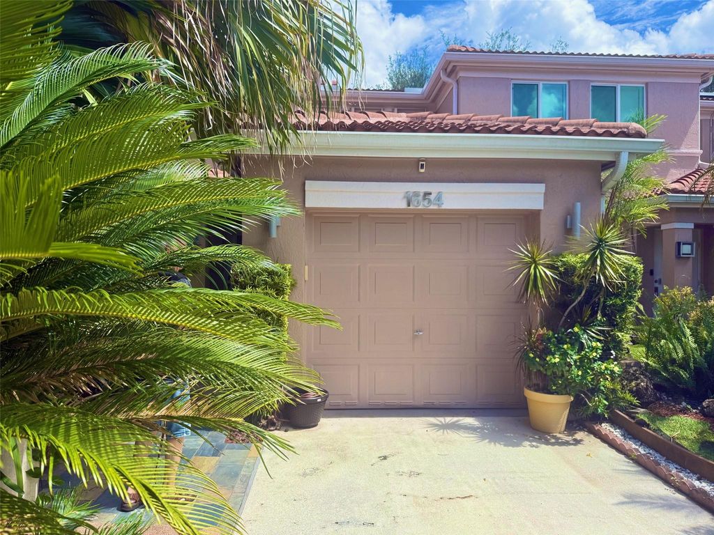 Photo of 1654 SW 109th Ter, Davie, FL 33324 (MLS # F10526657)