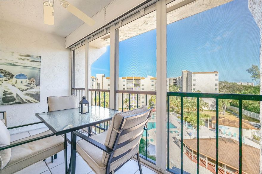 Lovely corner penthouse!  Remodeled!  Fabulous views on the pool area & gazebo from the terrace with Roll Shades! Sold fully furnished. Light & Bright! Impact windows, lovely berger carpet thruout! Washer & dryer in unit. Spacious master bedroom with 2 walk-in closets. . Kitchen nicely remodeled with large opening onto the dining rm, bathrooms redone too!. AC 2016 New electric panel! New tankless water heater! Cable TV & HBO & internet included in maintenance! 24/7 guarded gate and fenced in! 55+ community. No Pets. Features tennis courts, heated pool, clubhouse, BBQ area, pickle ball courts, & much more. Per Association 710+ credit required, 55+, $45k minimum income, 6 months maintenance in escrow & requires 20% down with offer. if financing 25%.  A great community to live in!