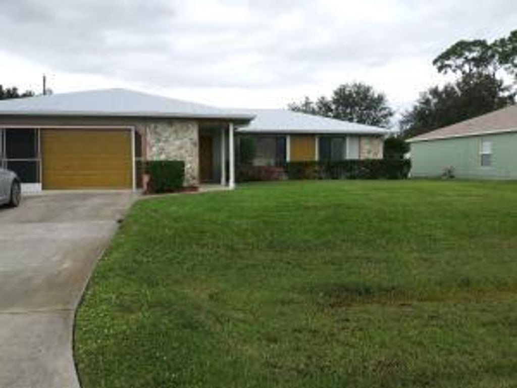 Photo of 166 NW Heather Street, Port Saint Lucie, FL 34983 (MLS # R10786483)