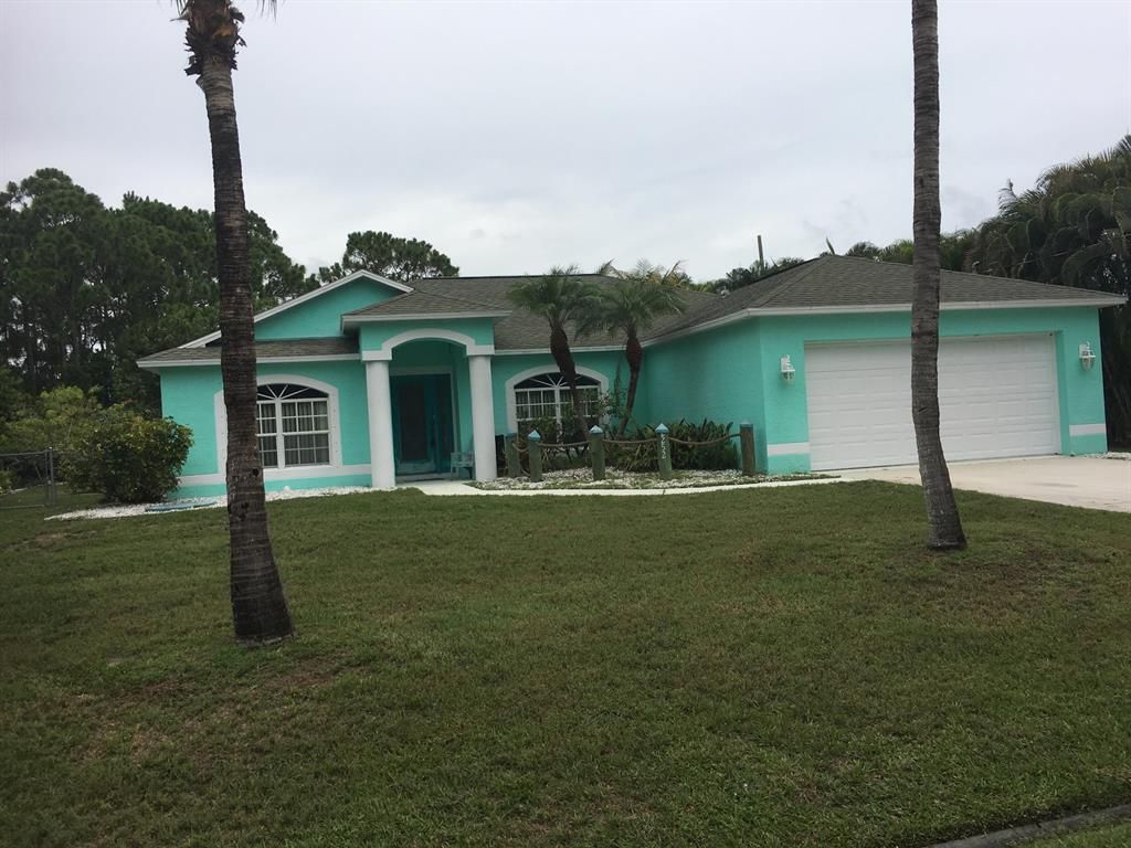 Photo of 2252 SE Rock Springs Drive, Port Saint Lucie, FL 34952 (MLS # R10727746)