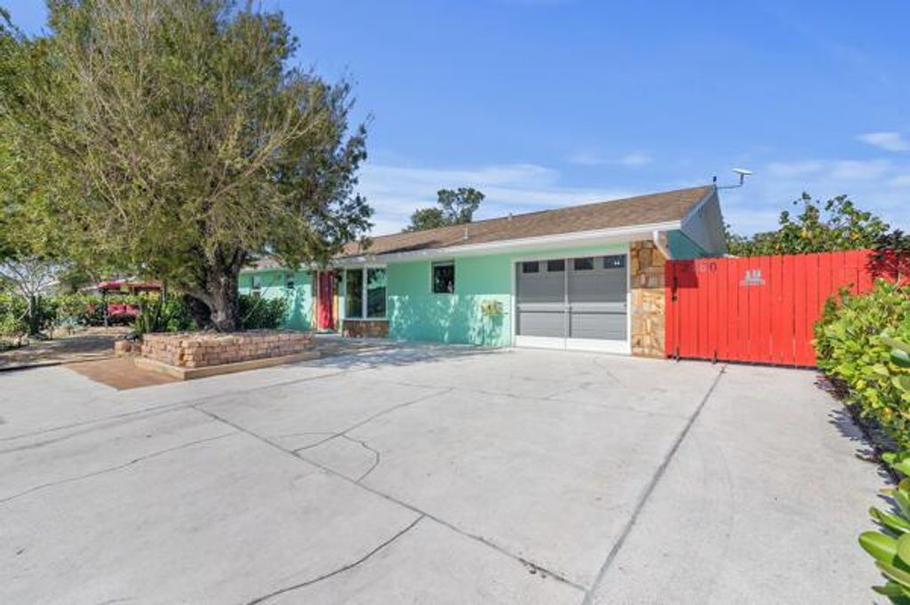 Photo of 2180 SE Floresta Drive, Port Saint Lucie, FL 34984 (MLS # R11088020)